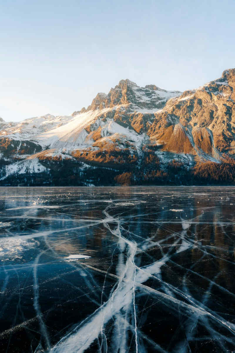 Wall Poster - Frozen Lake in the Swiss Alps